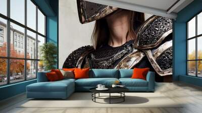 medieval female knight warrior in armour and helmet Wall mural