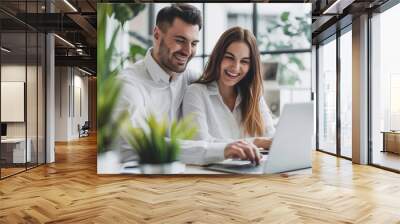 smiling businesswoman and businessman working together Wall mural