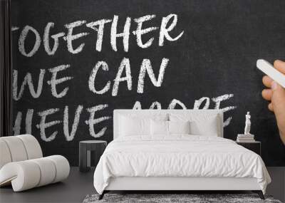  Text written on a blackboard -  Together we can achieve more Wall mural