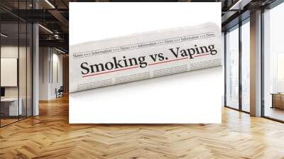 Rolled newspaper with the headline Smoking vs. vaping Wall mural