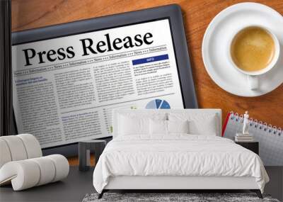 Tablet on a desk - Press Release Wall mural