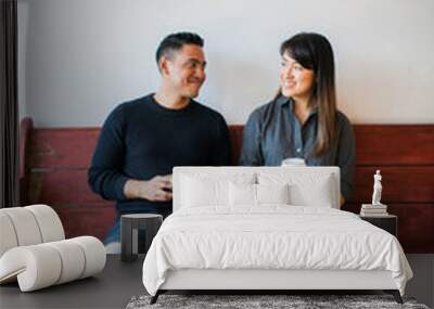 Two friends enjoying a coffee on a bench Wall mural