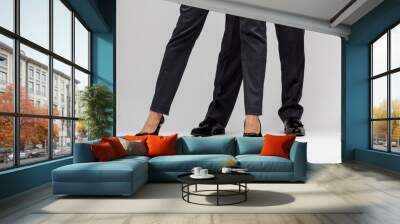 male and female businessperson's legs Wall mural