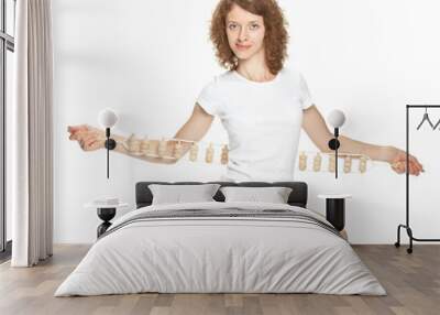 Smiling girl holding massager Wall mural