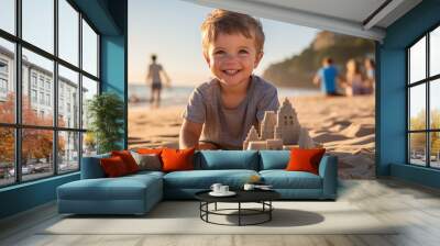 A boy playing in the sand on a sandy beach, building a sandcastle, focused and joyful. Wall mural