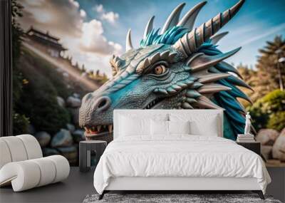 A blue dragon with a large mouth and long blue tail Wall mural