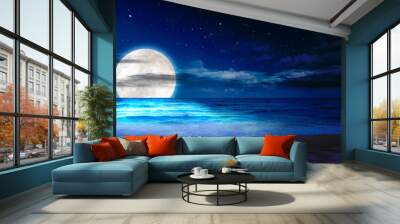 Beach, sea and moon in blue space. Amazing view of the blue color in the sky. Background night sky with stars, moon and sand-beach. The image of the moon of incomparable beauty. Wall mural