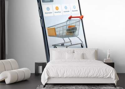 Smartphone displaying an online shopping app with a cart and products listed for purchase Wall mural