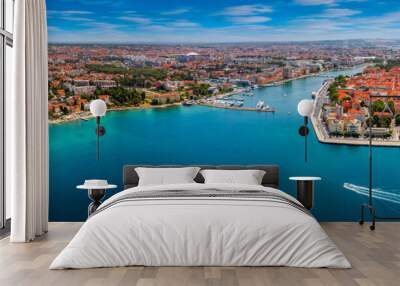 Zadar, Croatia - Aerial panoramic view of the old town of Zadar by the Adriatic sea with motorboat, yacht harbor and blue sky on a bright summer day Wall mural