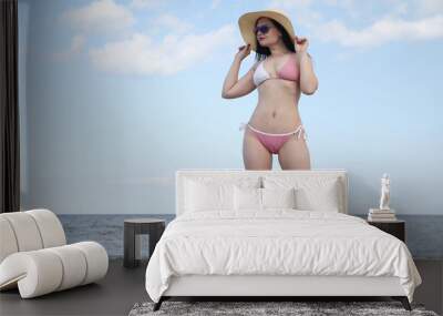 lady in fashionable swimsuit Wall mural