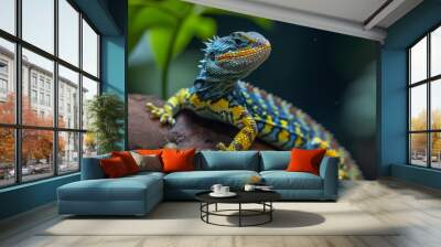 A colorful spiny lizard perched on a branch, displaying vivid blue, yellow, and orange patterns. The lush green background enhances its striking appearance, making it a captivating subject for Wall mural