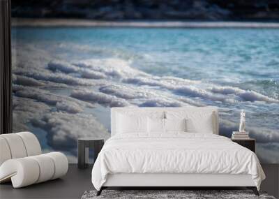 Crystallized white salt on the coast of a Dead sea closeup. Wall mural