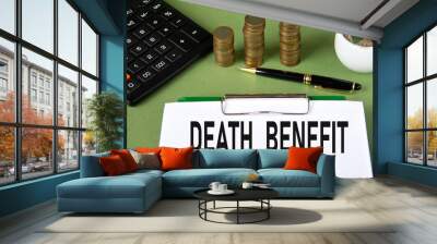 DEATH BENEFIT - words on a white sheet with a calculator and stacks of coins in the background Wall mural