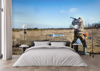 Sports skeet shooting with a hunting rifle Wall mural