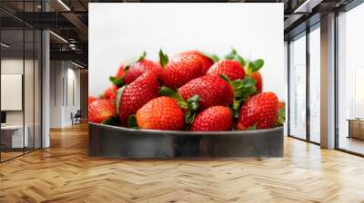 Organic strawberry in metal bowl. Close-up. Wall mural