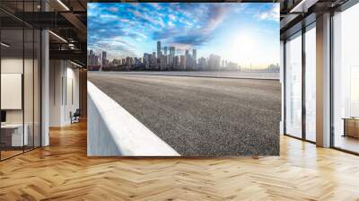 Empty asphalt road and modern city skyline background in Chongqing Wall mural