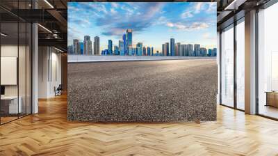 Empty asphalt road and modern city skyline background in Chongqing Wall mural