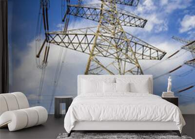 Pylon under the blue sky white clouds Wall mural