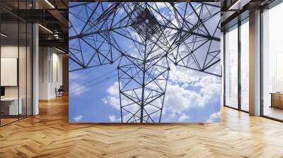 Pylon under the blue sky white clouds Wall mural