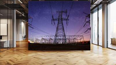 The high voltage tower and the Milky Way at night Wall mural