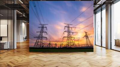 The pylons are in the evening, Substation in the evening, High voltage substation and beautiful sunset glow Wall mural