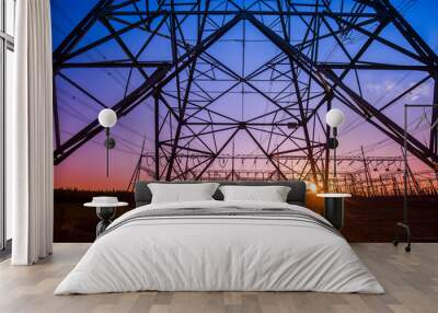 The silhouette of the evening electricity transmission pylon Wall mural