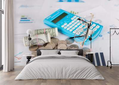 Calculator and dollar currency related to financial investment Wall mural