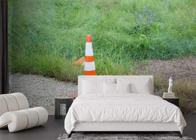  traffic cones and orange stripes close up Wall mural