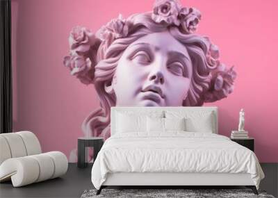 Ancient Greek statue of a girl with long hair on a pink background. Beautiful sculpture of a female goddess for modern art Wall mural