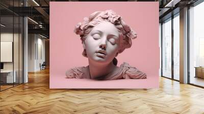 Plaster Sculpture female face in frontal view. Close up Pink gypsum Ancient statue woman Godhead isolated on pastel background. Renaissance portrait with closed eyes. Wall mural