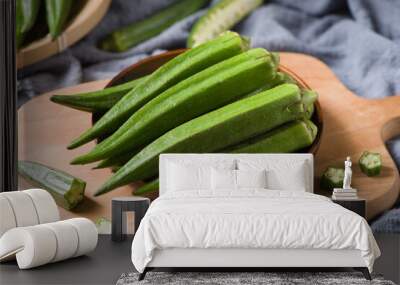 Fresh okra vegetable on wood backgroud Wall mural