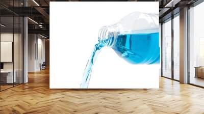 pouring of blue windshield washer  fluid on white background Wall mural