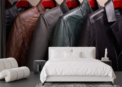 New collection of different color spring leather jackets for men. Colorful background of modern outerwear. Wall mural