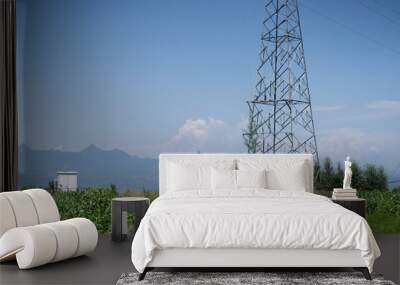 electricity pylon on hill Wall mural