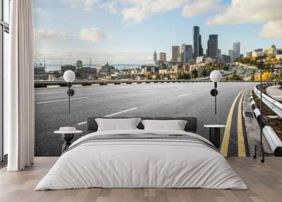 empty road with cityscape of modern city in blue sky Wall mural