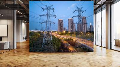 high-voltage power lines. high voltage electric transmission tower at night Wall mural