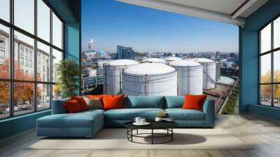 Oil storage tank with oil refinery background Wall mural