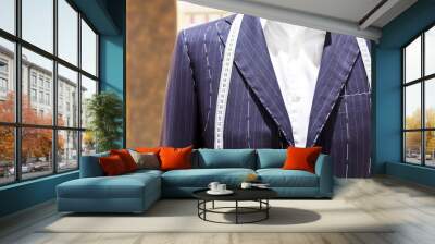 Suits on shop mannequins Wall mural