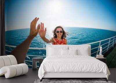 A woman is sailing on a cruise ship Wall mural