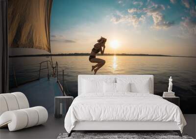 Girl jumping into the water from a yacht Wall mural