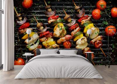 Grilled vegetable and meat skewers in a herb marinade on a grill pan, top view Wall mural