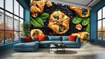 Spinach puffs with addition of gogonzola cheese, walnuts and sesame seeds Wall mural