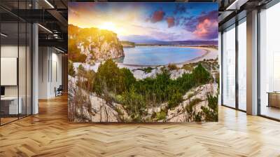 Amazing sunset view with multicolored clouds. Incredibly romantic sunrise on Voidokilia beach, Ionian Sea, Pilos town location, Greece, Europe. View of the ocean. Tropical beach Wall mural