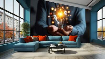 Businessman holding creative light bulb with growth graph, network icons. Leveraging innovation technology to develop new networks and solutions that enhance successful and profit in global business. Wall mural