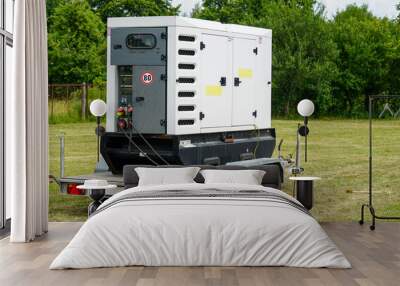 Connected large rental diesel generator on a mobile trailer for outdoor event power supply Wall mural