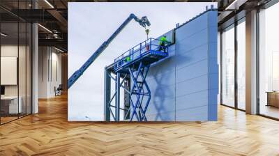 sandwich panels wall mounting using crane and scissor lift Wall mural