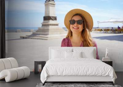 Welcome in Apulia. Portrait of pretty stylish girl smiling looking at camera in Otranto, Salento, Italy. Wall mural