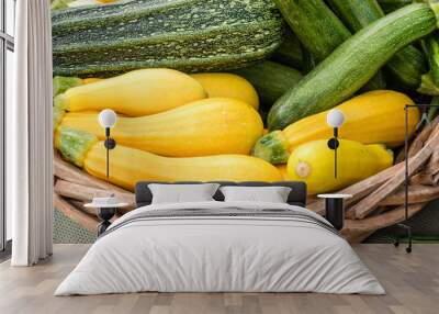 Yellow summer squash on display in baskets Wall mural