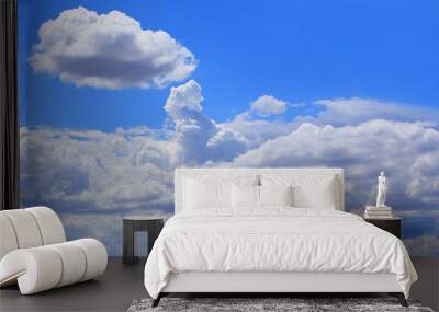 blue sky with white fluffy cloud background Wall mural