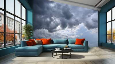 dark storm clouds on sky at evening background Wall mural